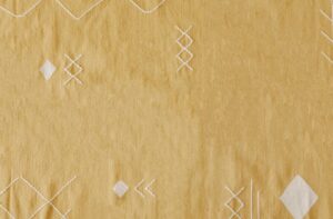 Yellow scattered stitch rug